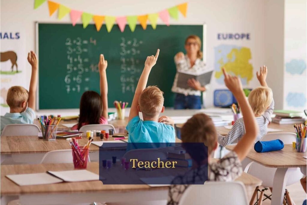 A teacher engaging with students in a classroom.